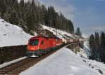 1116 094 + 1144 056 mit einem Gterzug am 23.02.2013 am Steinbach-Viadukt bei Bad Hofgastein.