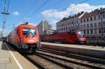 1116 038 mit dem IC 866 nach Bregenz in Wien Westbahnhof neben dem darauffolgenden RJ nach Mnchen. (11.4.2014)