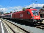 18.8.2014 12:55 ÖBB 1116 185 mit EC 87 nach Venezia Santa Lucia bei der Ausfahrt aus Kufstein. Wegen Bauarbeiten zwischen Rosenheim und Kufstein wurde der EC erst in Kufstein eingesetzt. Ein Ersatz EC fuhr von München bis Rosenheim, und wurde danach bis Kufstein mit Bussen ersetzt. 