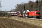 1116 189-2 ÖBB mit neuen VW´s Richtung Österreich.
Am 24.03.2015 bei Eglharting gespechtet.