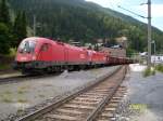 Zwei 1116 mit einem Güterzug am 20.7.2013 im Bahnhof Bad Gastein.