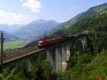 Hier zu sehen ist eine 3-fach Traktion bestehend aus einer 1116 und zwei 1144 mit einem Güterzug am 5.7.2015 auf der Pfaffenberg-Zwenberg-Brücke.