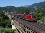 Die 1116 223 mit einem RJ am 18.08.2012 unterwegs bei Golling.