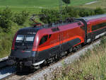 1116 156 schiebt Anfang August 2020 einen Railjet bei Moosleiten Richtung Freilassing.