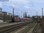 RJ 60 (+10) aus Budapest Keleti mit 1116 215 bei der Durchfahrt in Mnchen-Heimeranplatz, 20.03.2010