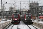 Paralleleinfahrt zweier Railjets am 28.12.10 in Mnchen Hbf: Links ist 1116 208 zu sehen, sie kam aus der Abstellung und fuhr dann als Rj 65 Richtung Wien, rechts ist 1116 226 zu sehen, die als Rj 260 aus Wien kam und wenig spter in die Abstellung fuhr.