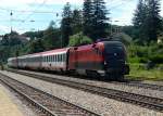 1116 209 mit einem OIC nach Wien West am 12.07.2009 bei der Durchfahrt in Tullnerbach-Pressbaum.