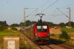 1116 212 schiebt bei Endorf einen RailJet nach Wien (Falschfahrt wg.