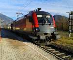 1116 241-1 mit railjet 533 (Wien Hbf - Lienz) am 8.12.2015 beim Halt in Greifenburg-Weißensee.