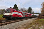 Der Ski-WM Railjet der ÖBB mit der 1116 249-4 am 12.11.16 bei Übersee am Chiemsee.