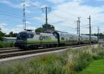 1116 141 mit dem City Airport Train am 12.07.2009 bei der Durchfahrt in Wien Zentralfriedhof.