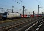 1116 038 mit einem REX nach Passau am 08.04.2009 bei der Ausfahrt in Linz.