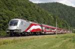 Nach wochenlangen Einsatz im Bereich der Westbahnstrecke kam die 1116 249 mit ihrer langen Fahne in den letzten Tage wieder auf der S�dbahn zum Einsatz. Hier zu sehen als RJ658 nahe Pernegg am 26.07.2013.