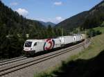 Die 1116 264 mit einer RoLa am 31.08.2013 unterwegs bei Wolf am Brenner.