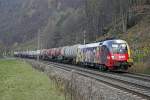 1116 153 zieht am 18.11.2013 einen Kesselwagenzug zwischen Bruck/Mur und Pernegg Richtung S�den.