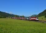 1116 249 mit einem umgeleiteten Railjet nach Wien am 17.08.2014 bei Hochfilzen.