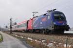 Die 1116 168-6 „Vegatrans & Rail Cargo Group Lok“ der ÖBB am 10.03.16 bei Übersee am Chiemsee.