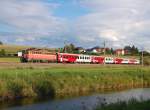 1142 567 hat am 09.08.2011 mit dem Rex 3912  soeben den Bahnhof Wartberg/Kr.