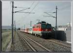1142 688 mit dem E 4167 von Graz nach Spielfeld aufgenommen in Graz-Feldkirchen am 20.6.2006.