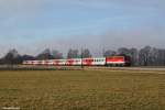 1142 693 und 1142 644 mit M 79015 am 21.12.2013 bei Übersee.