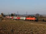 Die 1142 575 mit einem REX nach Linz am 15.03.2015 unterwegs bei Haiding.