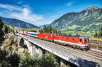 1144 223-5 und 1116 187-6 fahren mit der ROLA 43251 (Salzburg - Fernetti) über die neue Angerschluchtbrücke.
