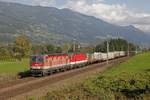 1144 032 + 1144 253 mit Güterzug bei Trieben am 28.09.2017.