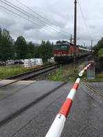 Die ÖBB 1144 113 ist mit einem IC kurz vor Radstadt unterwegs