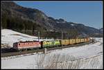 1144 074 + 470 502 mit Güterzug bei St.Georgen ob Judenburg am 7.02.2020.