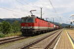 Mit dem DG54703 von Wien Zvb warten am 29.6.2022 die 1144 049 und 1144 202 im Bahnhof Krieglach auf die Vorfahrt des RJ73 bevor die Reise nach Graz Vbf weitergeht