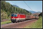 1144 239 mit Güterzug bei Steinach am Brenner am 20.05.2004.