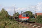 1144 208 mit leerem Autozug in Limmer am 02.10.08