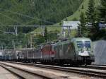 Die 1116 264 (Euromotion) und die 1144 235 am 11.06.2009 mit einem KLV Zug bei der Einfahrt in den Bahnhof Brenner.