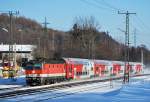 1144 290 samt DS Garnitur als REX nach Amstetten bei der Durchfahrt in Rekawinkel am 27.1.2010.