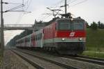 1144 224-1 mit dem R 1551 von Wiener Neustadt-Payerbach auf der Sdbahn bei Neunkirchen.