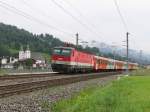 1144 223 mit REX 1504 Salzburg Hauptbahnhof-Wrgl Hauptbahnhof bei Brixen im Thale am 11-8-2010.