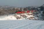 REX 1629 ist an diesem Winternachmittag Richtung Wien Westbahnhof unterwegs.