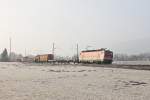 1144 215 mit einem gemischten Gterzug am 05.03.2011 bei Niederaudorf.