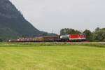 1144 242 mit einem gemischten Gterzug am 03.08.2011 bei Niederaudorf.