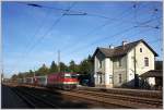 1144 209 mit REX 2174 bei der Durchfahrt in St. Andr-Wrdern. 29.09.11