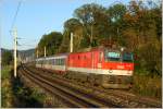 Mit den ersten Sonnenstrahlen, kam auch 1144 124 mit EN 234  Allegro Tosca  von Rom nach Wien, an unserer Fotostelle vorbei. 
Gloggnitz 18.10.2011