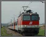 1144 283 mit ihrem E 4163 kurz vor Wildon auf dem Weg nach Spielfeld am 25.4.2006