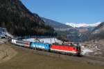 1144 210 + 1016 023 mit einer Rola nach Wrgl Terminal am 08.03.2011 unterwegs bei St. Jodok am Brenner.