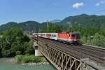 1144 113 mit einem REX am 16.06.2012 bei der berquerung der Salzach in Golling-Abtenau.