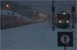 Ein schner Wintertag beginnt - REX 2105 (Gmnd N-Wien FJB) im Schneetreiben in Wien Nudorf.