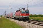 1144 107 mit R2335 (Wien Floridsdorf - Payerbach-Reichenau) am 24.05.2013 zwischen Theresienfeld und Wiener Neustadt.