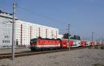 Der von der 1144 232-6 gezogene R 2217 von Retz nach Wien Meidling durchquert am 07.Juli 2013 die Stein- und Betonwste beim Praterstern.