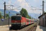 1144 044 mit REX 1504 Salzburg Hauptbahnhof-Wrgl Hauptbahnhof auf Bahnhof Brixen im Thale am 21-7-2013.