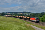 1144 228 mit einem Schotterzug am 29.06.2016 bei Haiding.