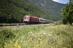 Die 1216 032 der ÖBB auf der Inntalstrecke bei Oberaudof in Richtung Kufstein. Aufgenommen am 26.07.21